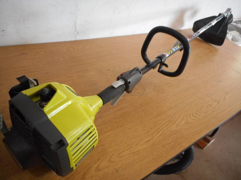 lot 41 image: Ryobi 2-Cycle 25cc Gas Full Crank Straight Shaft String Trimmer