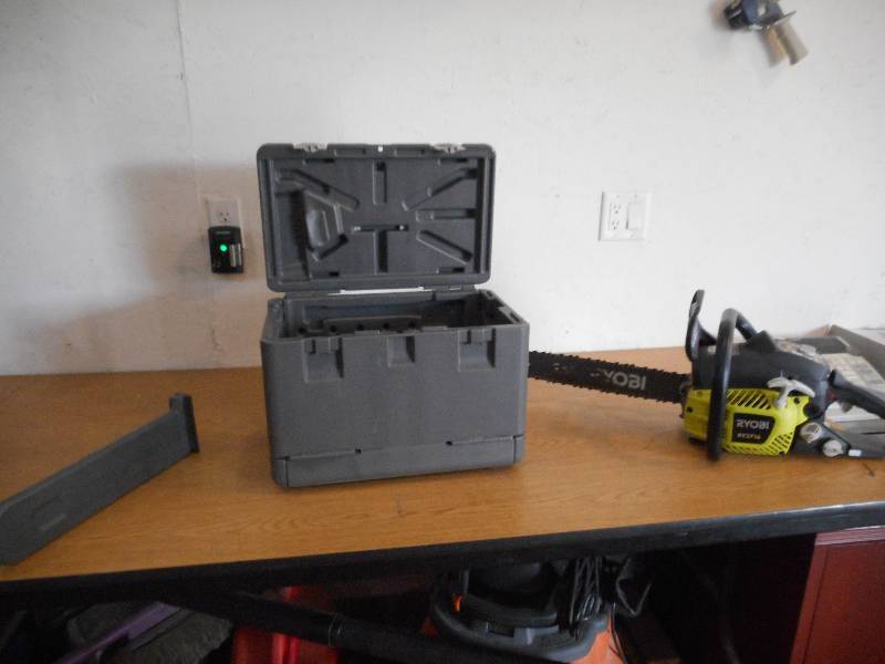 lot 46 image: Ryobi 16 in. 37cc 2-Cycle Gas Chainsaw with Heavy Duty Case