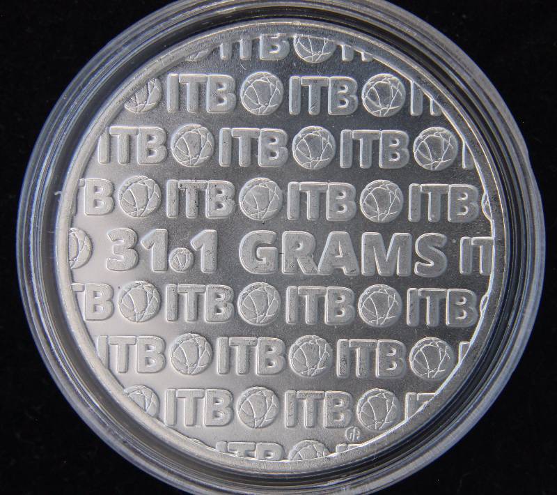 1 TROY OZ. .999 FINE SILVER INTERNATIONAL TRADE ROUND IN AIRTITE HOLDER