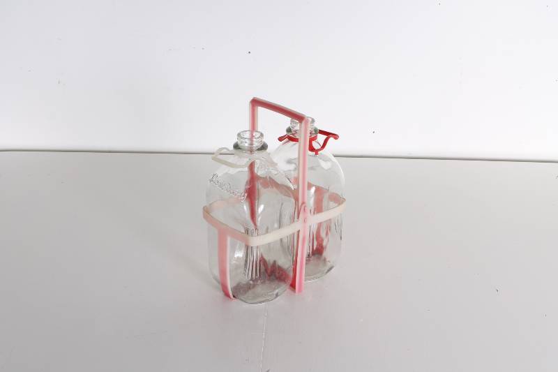 lot 49 image: Vintage Milk Bottles...