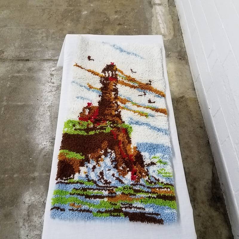 lot 125 image: Vintage lighthouse Latch Rug...