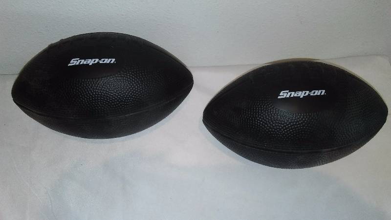 lot 67 image: Snap-on Footballs (2) Junior size, 8 inch x 5 inch, Soft spongefoam interior