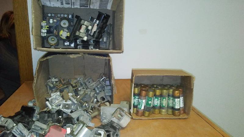 lot 23 image: Meter Socket Parts, Buss Fuses (24) and fuse holders