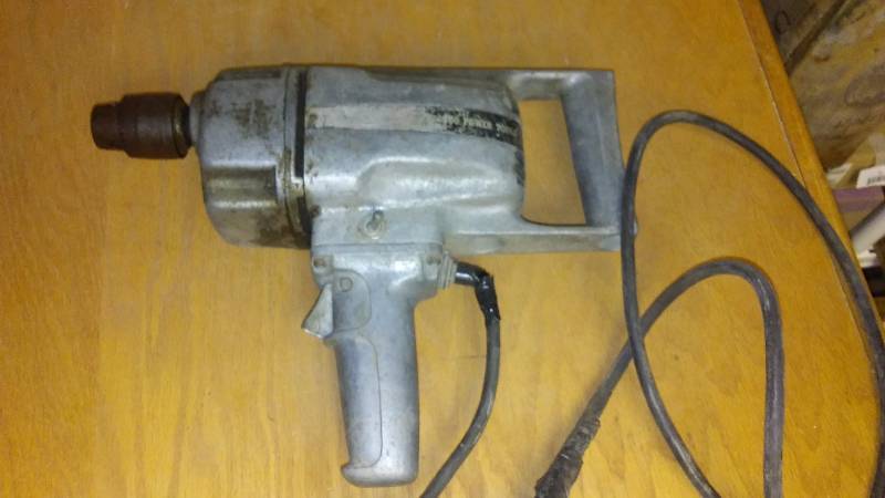 lot 152 image: Chicago Power Tool,  in. reversible Drill, tested and works