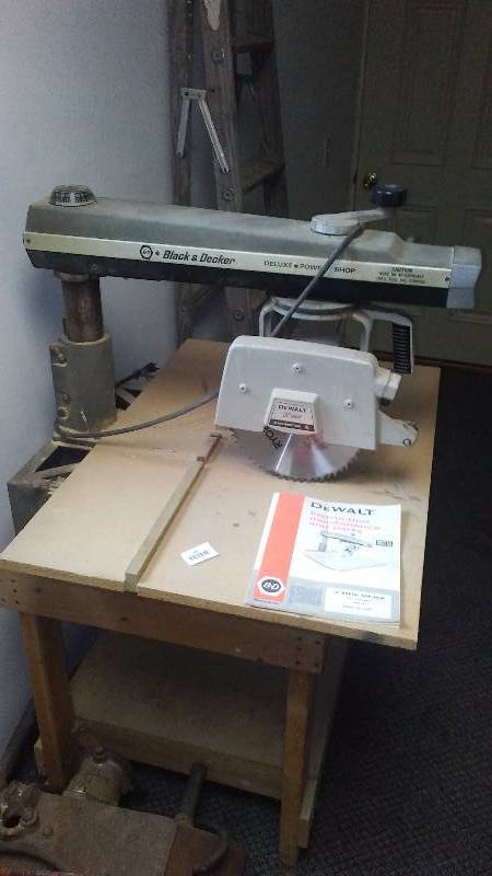 lot 187 image: 10 in. Radial Arm Saw with stand, Black and Decker Radial Arm  DeWalt Saw powers up