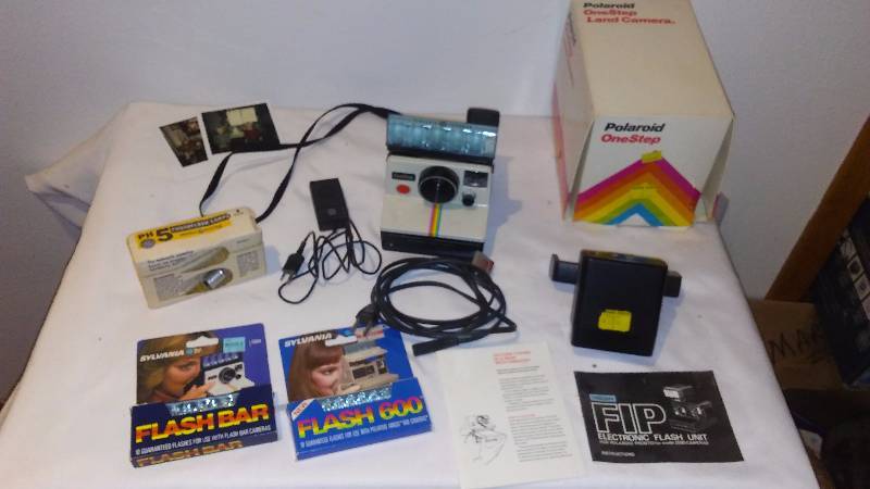 lot 89 image: Polaroid One Step Rainbow Stripe Land Camera