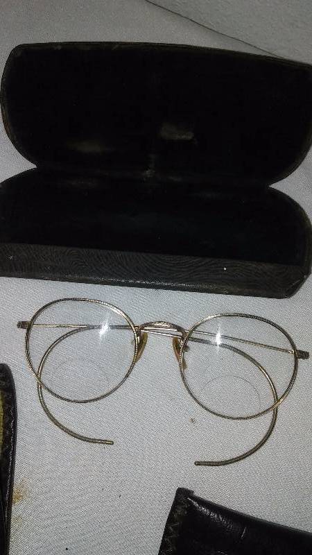 lot 119 image: Vintage Eyewear (4), 32 in. leather belt (new) John Lennon style