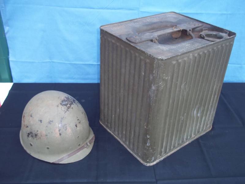 lot 5 image: Rare Square Air Force gas can with vintage Combat hat liner