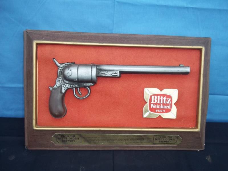 lot 8 image: Blitz Embosograph Beer Sign and 3d Texas Colt .36