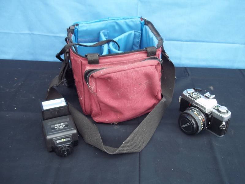 lot 20 image: Minolta XG1 camera with 15mm lens and case