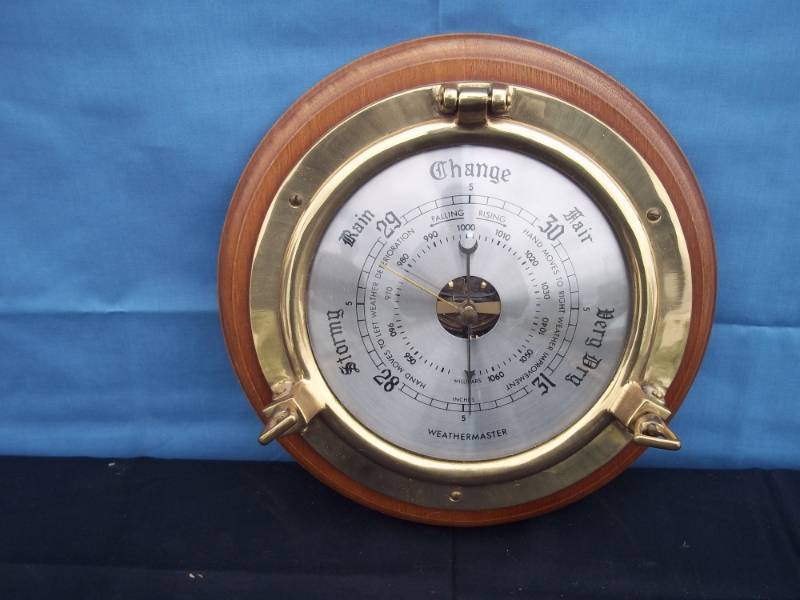 lot 49 image: Wather Master Brass Porthole Barometer