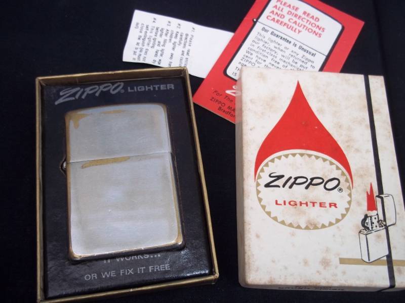 lot 60 image: Vintage 1960 Zippo lighter with box includes paperwork