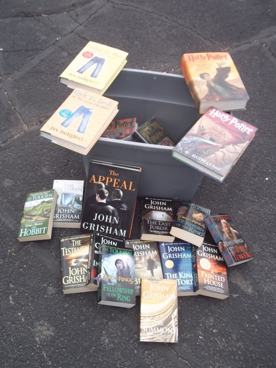 lot 110 image: Lot of books with tote including Harry Potter, John Griffin, Toliken, etc