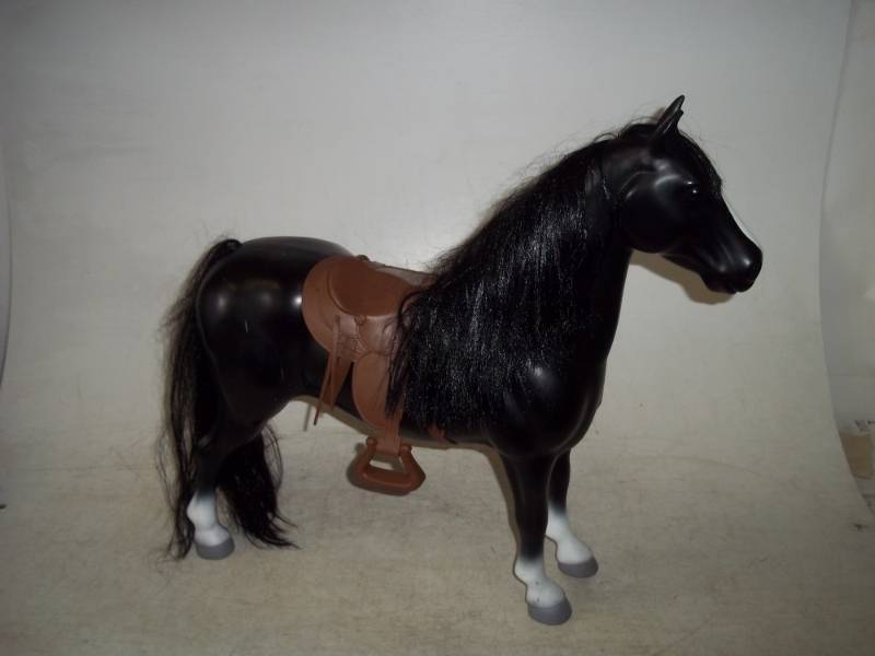 lot 174 image: Black Horse with saddle