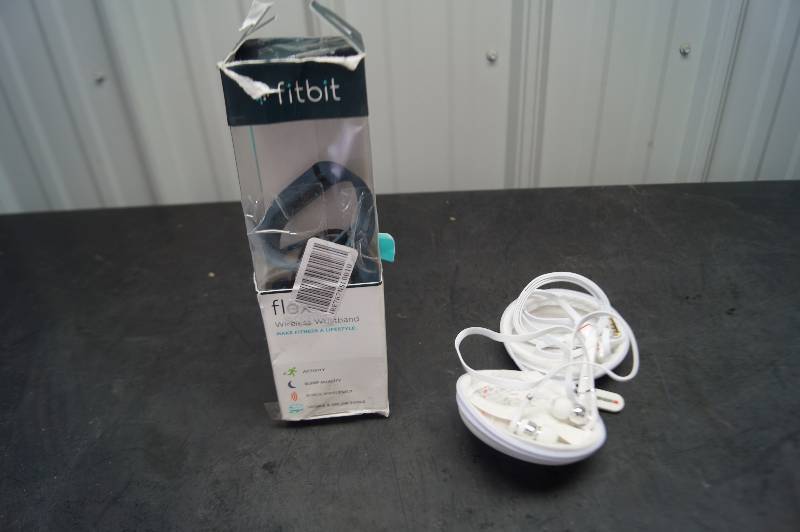 lot 113 image: Fitbit & Beats by Dre