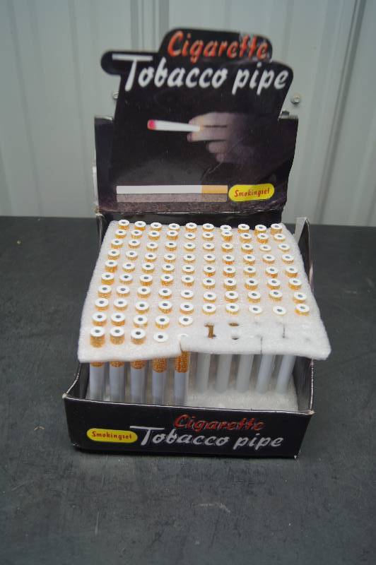 lot 124 image: Cigarette Tabacco Pipes
