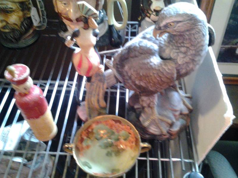 lot 128 image: Falcon Statue, 2-Handled China Tea Cup, Vintage 2 Piece Soldier Hat Pin Holder 