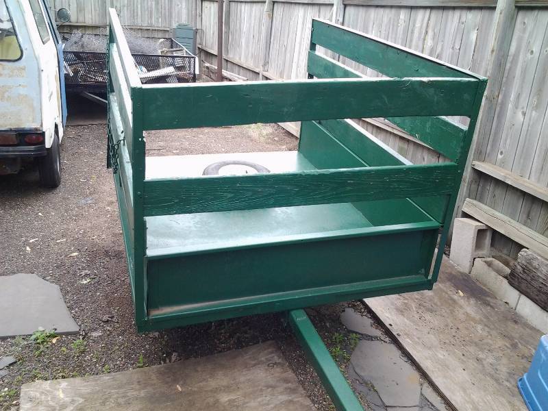 lot 165 image: LawnGarden Trailer With Tilt Bed, Home Made Heavy Duty (No Lights) 1 78 Hitch Ball- 65 Long51 12 Wide 35 Inch Tall Sides 3-4.8x8 Wheels