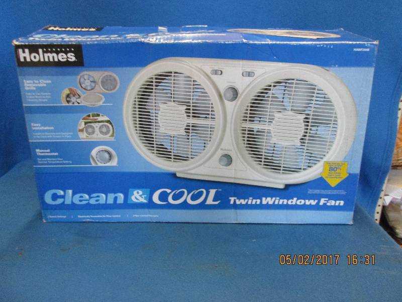lot 9 image: Holmes twin window fan. Tested and ...