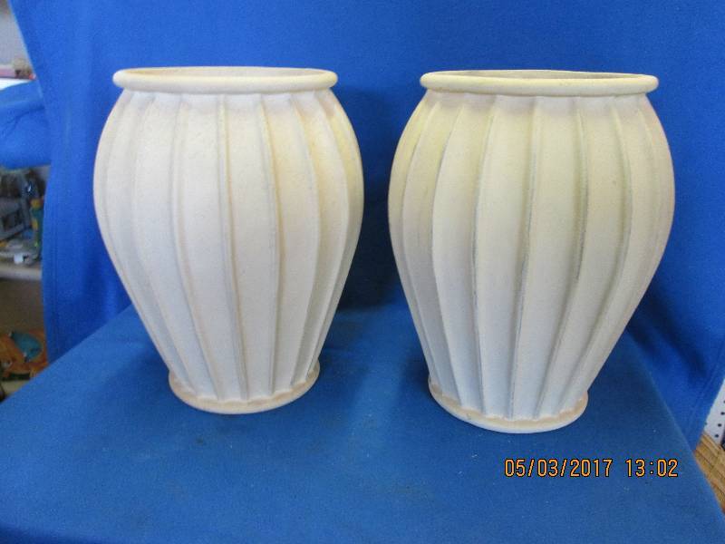 lot 16 image: Lot of 2 large ribbed jar planters....