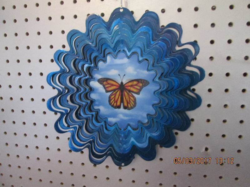 lot 17 image: Metal butterfly wind spinner.Approx...