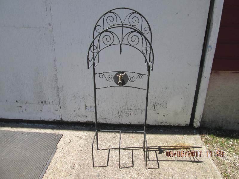lot 45 image: Decorative hose stand with fauset. ...