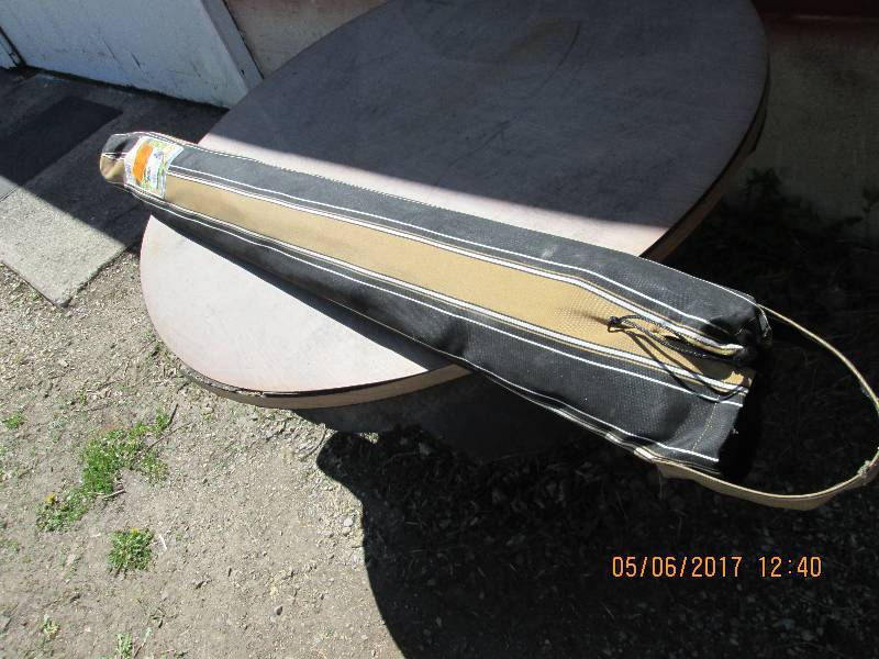 lot 55 image: 9ft tilting umbrella with storage b...