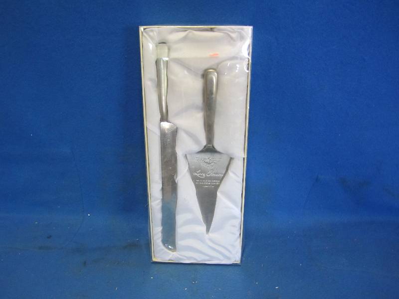 lot 78 image: Wedding cake stainless steel servin...