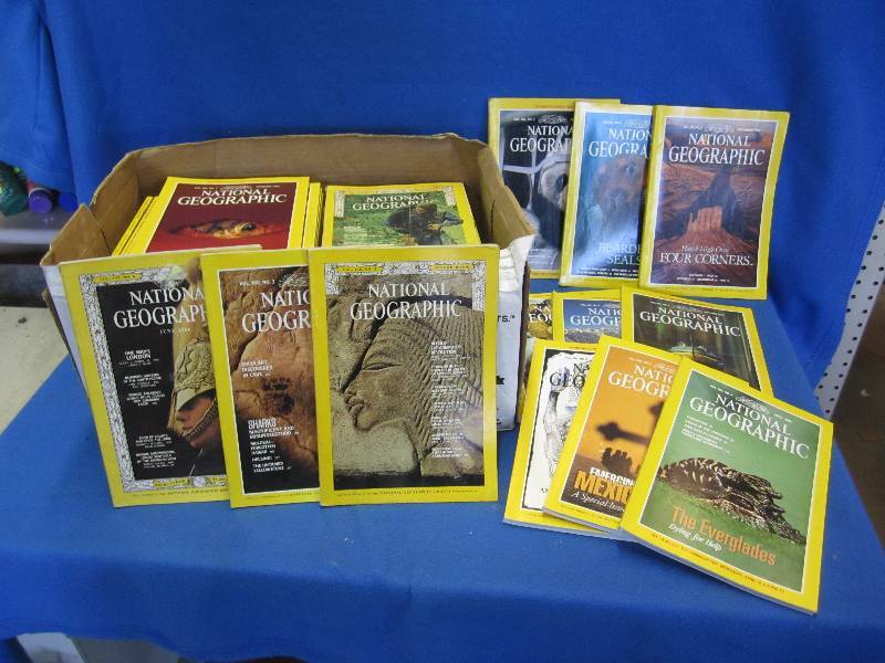 lot 80 image: Box full of National Geographics ma...