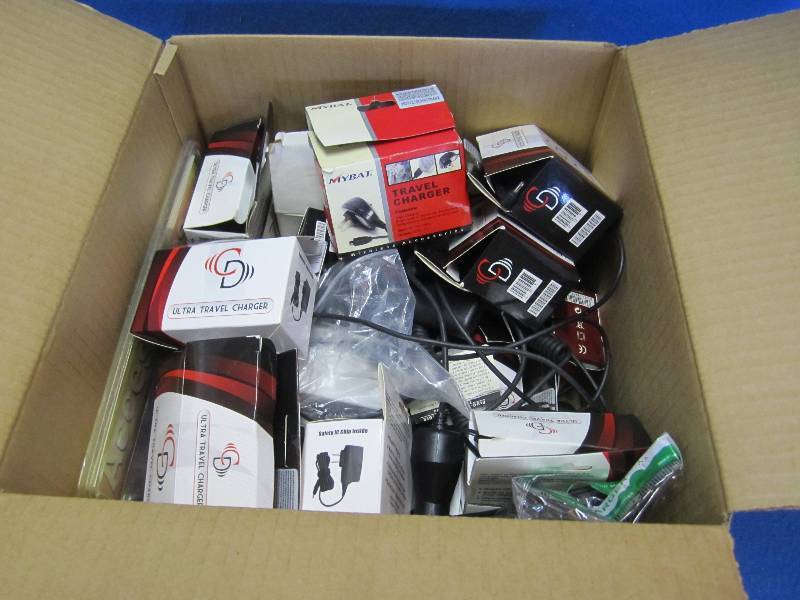 lot 82 image: Box full of misc. travel chargers. ...