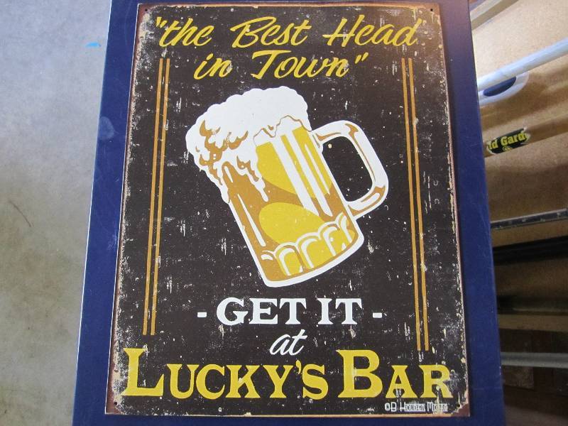lot 99 image: Metal sign. Luckys Bar. 12.5 x 16...