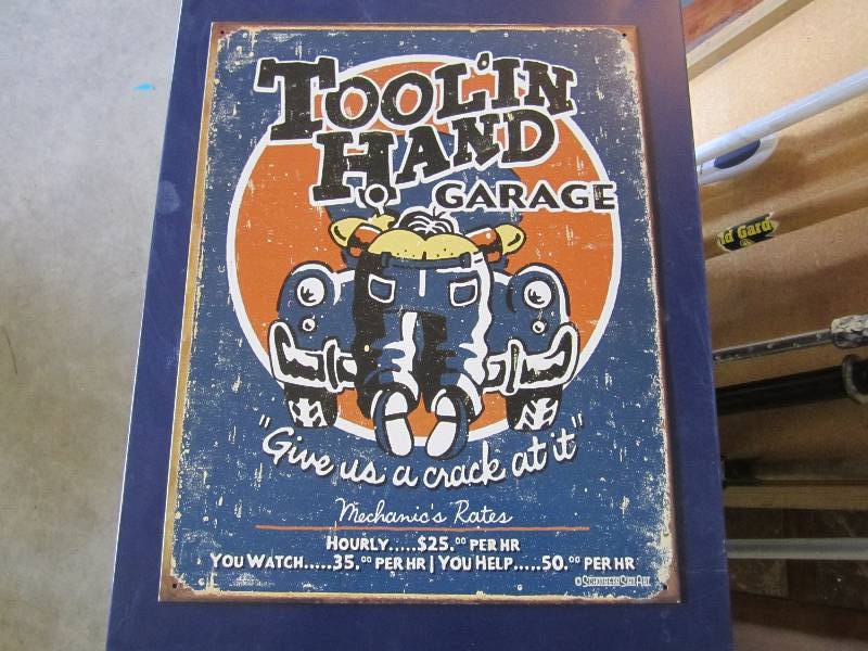 lot 102 image: Metal sign. Toolin Hand Garage 12....
