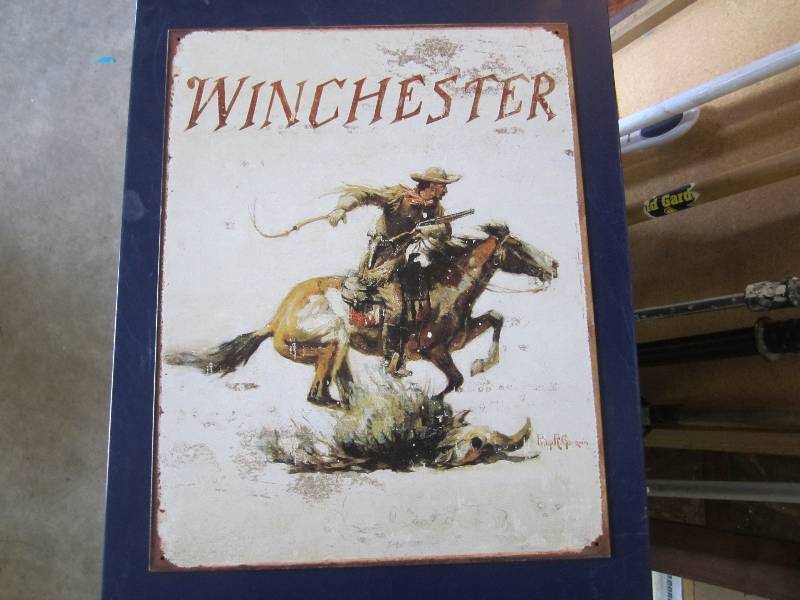 lot 105 image: Metal sign. Winchester 12.5 x 16...