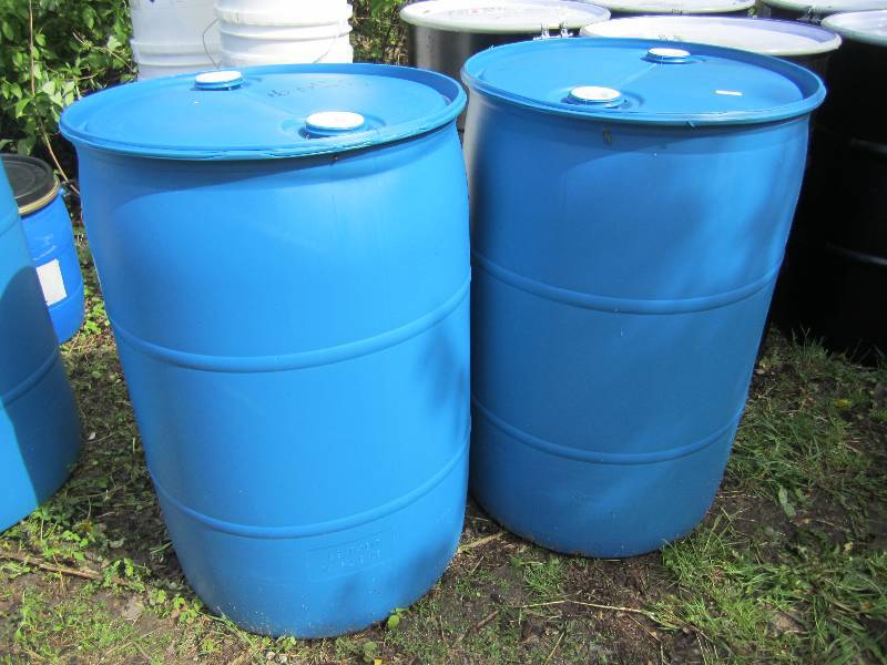 lot 116 image: 2 - 55 gallon plastic barrels....