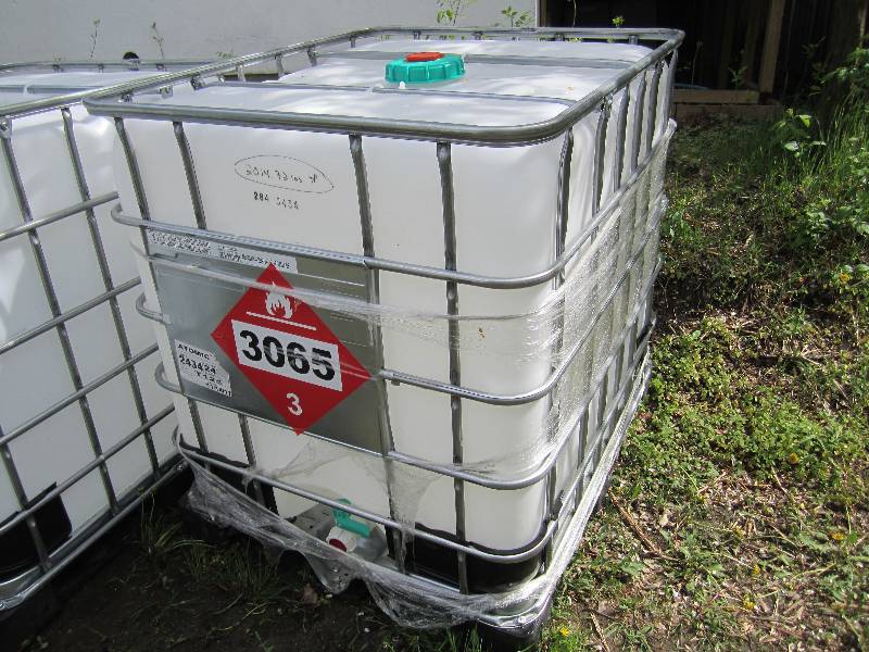 lot 123 image: Large plastic container with metal ...