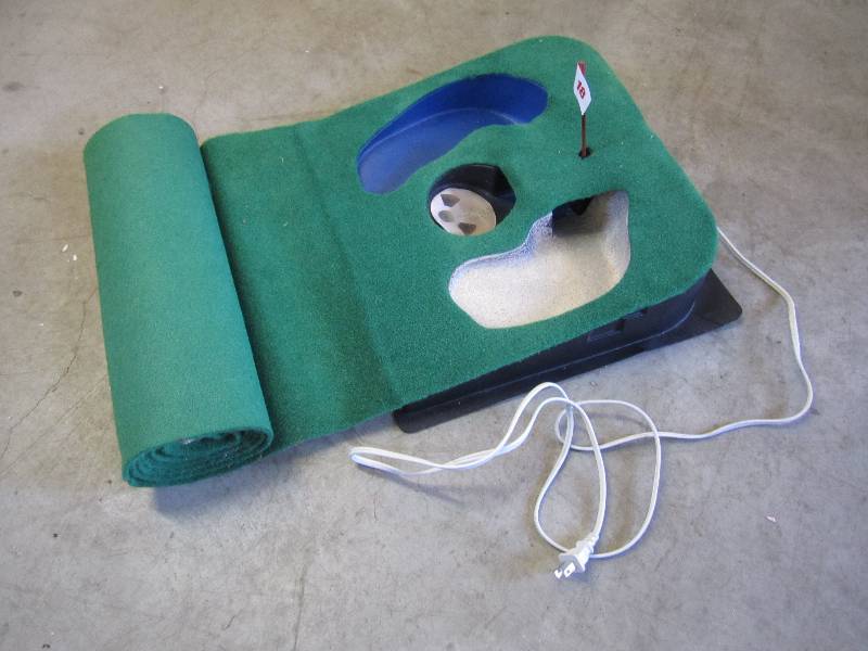 lot 132 image: Putting green with realistic hazard...