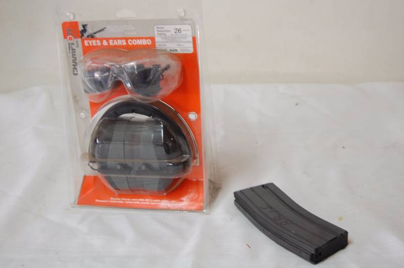 lot 65 image: AR 15 Banana clip and eye and ear protection