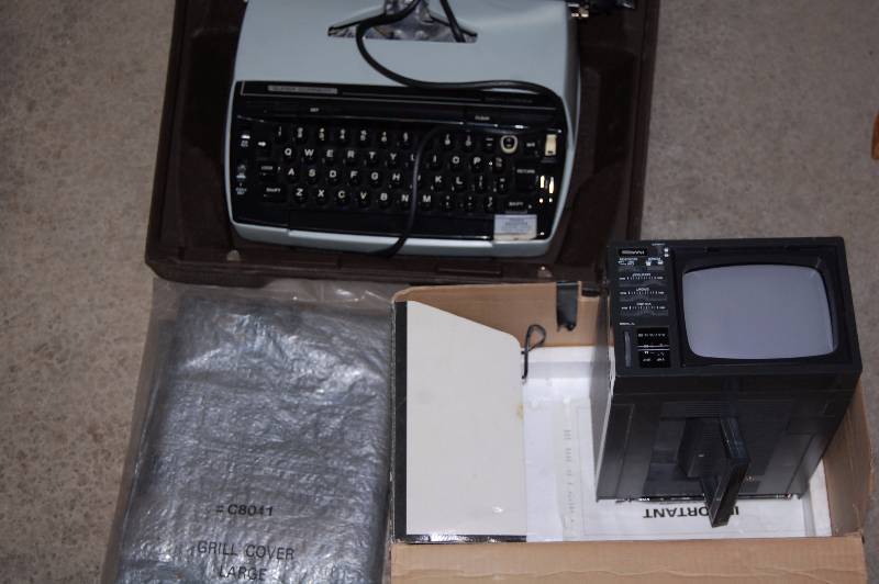 lot 272 image: Portable TV and Typewriter and Grill Cover
