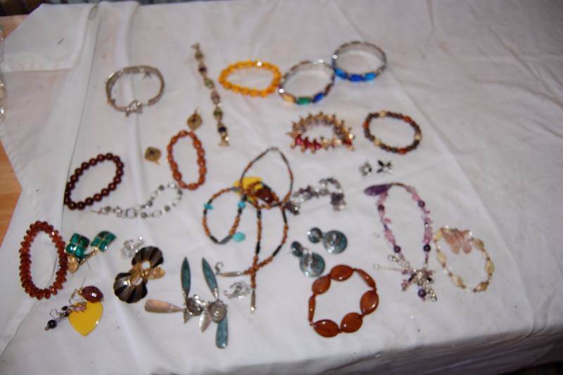 lot 401 image: Charm Bracelets and Earrings