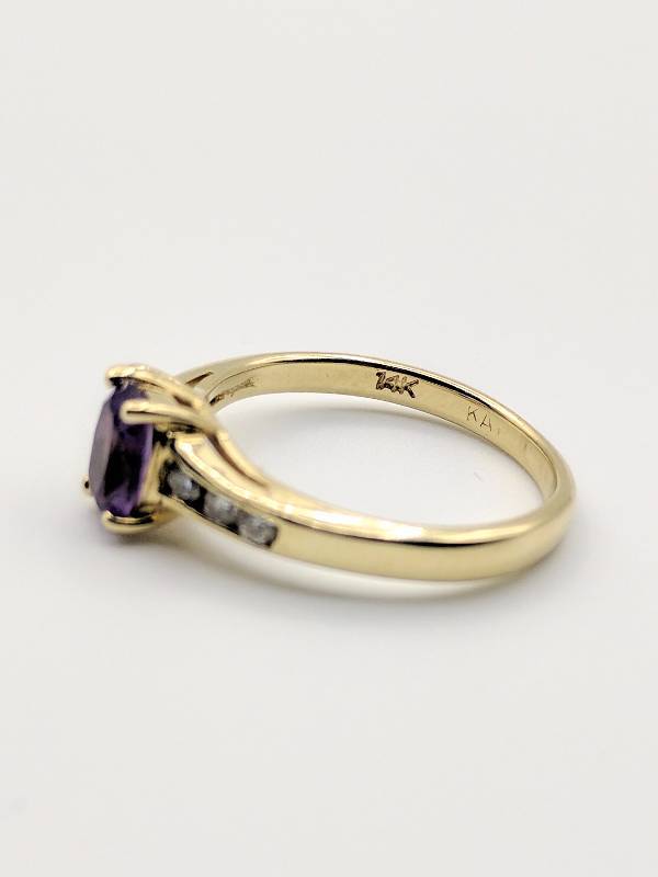 .37 CT Oval Amythest, 14kt Diamond Accent Ring Size 4.25