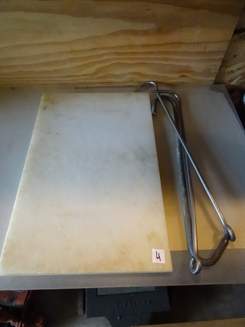 lot 4 image: 24 x 15 cutting board. 3 meat hangi...