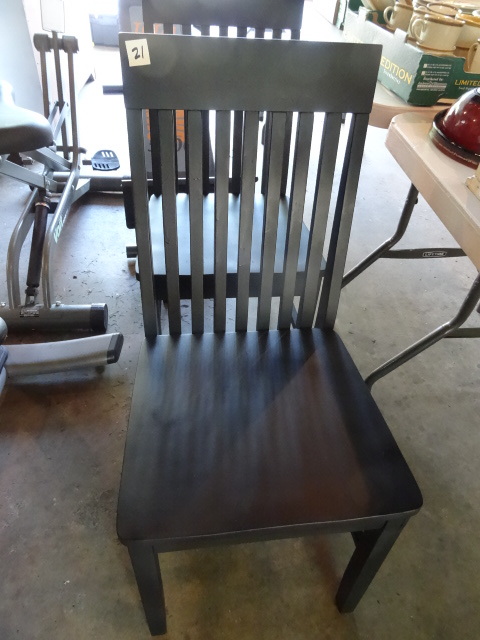 lot 21 image: 2 wooden kitchen chairs. Wood is ma...