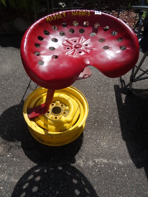 lot 68 image: Vintage Massey Harris metal seat mo...