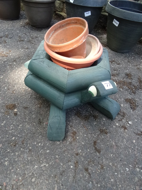 lot 77 image: Wooden turtle flower pot holder...