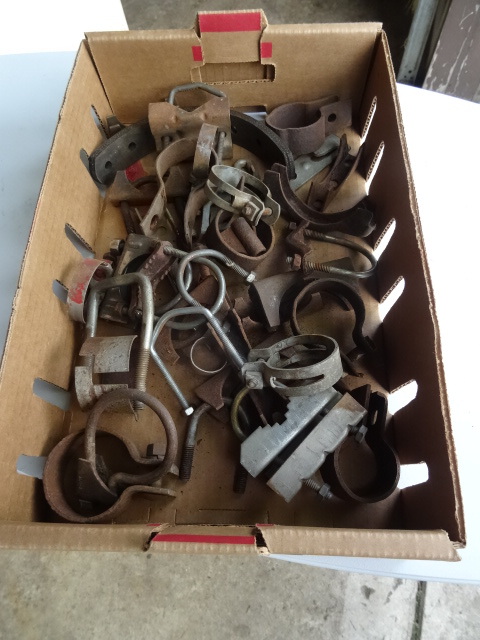 lot 140 image: Box of misc muffler clamps. Camper ...