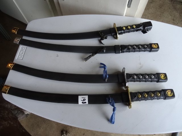 lot 198 image: 4 plastic kids swords...