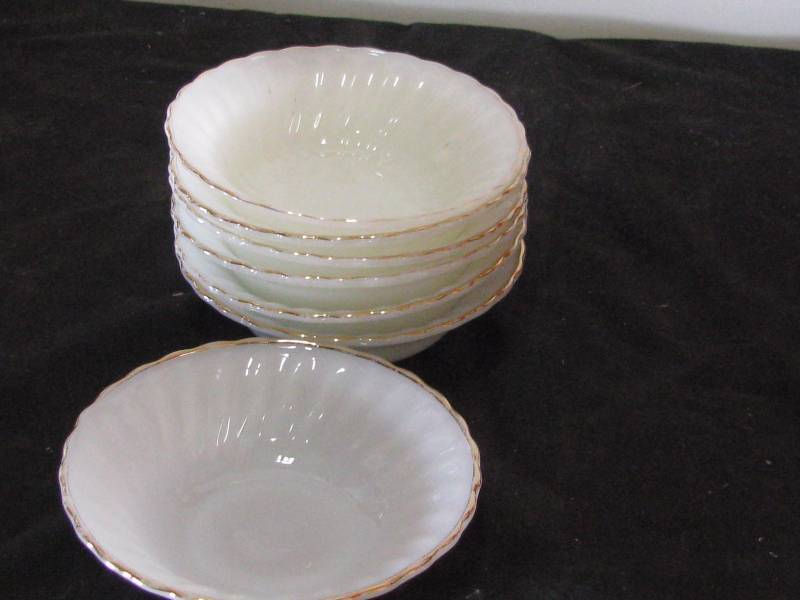 lot 64 image: Fire King Swirl Swirl Cereal bowls
