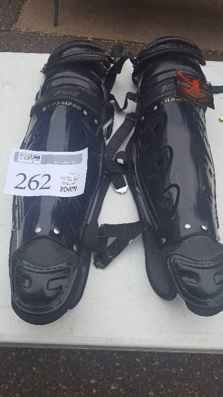 lot 262 image: NEW Champro CGO1 16 Inch Catcher Shin Guards