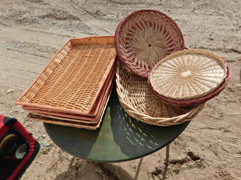 assorted wicker serving items