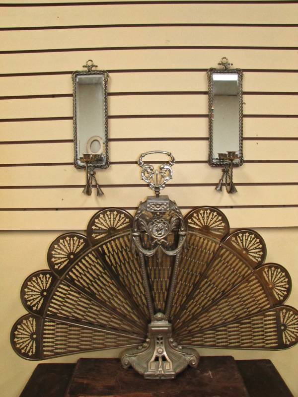 fan fireplace screen and wall mirriors